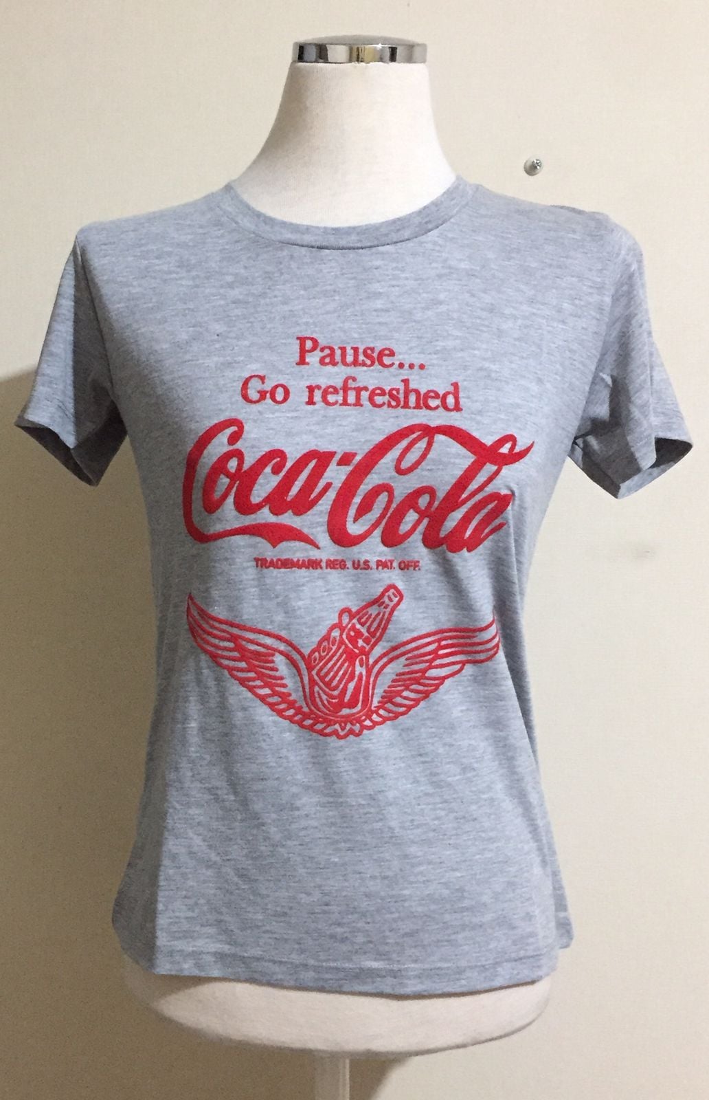 Polera coca cola online mujer